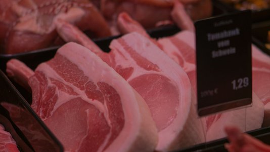 fresh raw meat displayed at butcher shop
