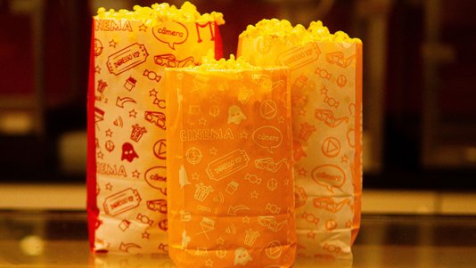 popcorn bags on a cinema concession counter